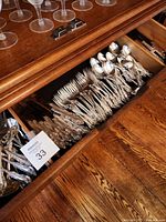 Drawer with forks and spoons showing ornate handles