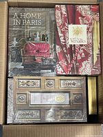 Top view of box with three large hardcover art and architecture books