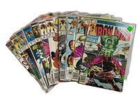 Set of 11 Iron Man comics with visible colorful covers, fan-favorite characters like Hulk shown, stacked fanned out for display.