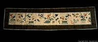 Full view of the antique silk embroidery panel showing the entire design and dark border.