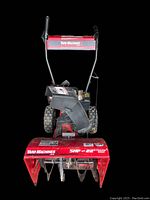 Front view of red Yard Machines snowblower showing 5 HP engine, 22" clearing width, and chute assembly.