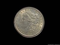 Close-up of the obverse (front) side of the 1885 Morgan Silver Dollar coin showing Lady Liberty profile and inscriptions.