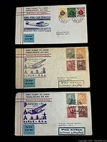 Front view of three First Flight to China Trans-Pacific Air Mail covers showing printed cachets and stamps