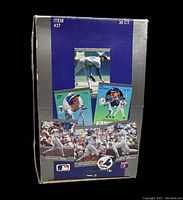 Box showing the back side with images of various players' baseball cards included in the set, includes baseball logos and text stating 36 count.