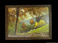 Frontal view of the framed photograph showing forest and fall foliage with autumn colors.