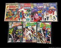 Front covers of ten Marvel comic books displayed side by side, featuring Mephisto vs Avengers, X-Men, X Factor, Fantastic Four, and three West Coast Avengers.