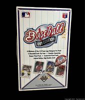 Front of factory sealed 1991 MLB Baseball Card box featuring the edition year, logos, and sample player card images.