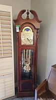 Front left view of Ridgeway grandfather clock in wood case