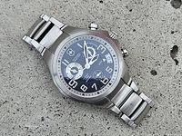 Full front view of Victorinox Swiss Army chronograph watch showing stainless steel bracelet and black dial.
