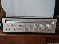 Front view of Yamaha CR-840 receiver showing controls and display panel
