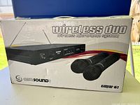 Box for the GenSound Wireless Duo wireless microphone system showing model and graphics