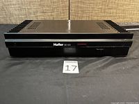 Front view of the Hafler SE-120 amplifier showing the model name and LED indicator.