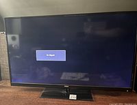 RCA 40-inch LED TV powered on showing 'No Signal' message on the screen.