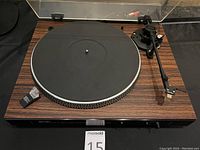Top view of turntable showing platter, mat and tonearm