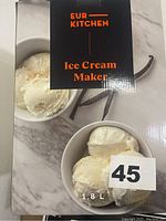 Front image of the EUR Kitchen Ice Cream Maker box showing ice cream scoops and vanilla beans, stating 1.8L capacity.
