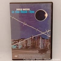Front cover of the DVD case showing the artwork for Roger Waters In the Flesh Live concert.