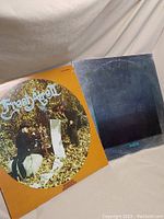 Two vinyl record album covers showing Mannheim Steamroller Fresh Aire and another Fresh Aire album cover with a nature theme.
