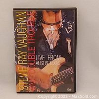 Front cover of Stevie Ray Vaughan and Double Trouble Live From Austin Texas DVD, showing Vaughan playing guitar and title text.