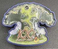 Photo of Disney Animal Kingdom 100 Years of Magic light up pin showing large tree shape with embedded lighting and classic Mickey Mouse.
