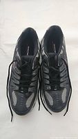 Top view of new black and gray Skechers Memory Fit sneakers size 11 with lace-up closure.