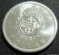 Reverse of 1964 Canada silver dollar showing floral emblem and inscriptions.