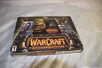 Closed Warcraft III Battlechest box displayed on a white surface showing front cover artwork