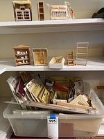 Tote filled with multiple sealed packages of bay window, window, door and trim kits