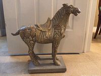 Side view of entire statue on base