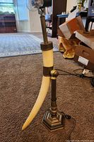 Full view of vintage Chapman adjustable table lamp with faux horn base and missing shade.