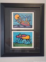 Front view of the framed lithograph print showing two colorful stylized moose images stacked vertically with black mat and frame.