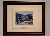 Front view of the framed art showing the scene, mat and frame details