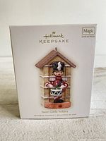 Box of Hallmark Keepsake ornament 'Sweet Little Soldier' showing branding and product name.