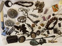 Overview of assorted jewelry and accessories on paper towel