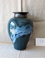Front view of the Alan Pace ceramic vase showing the artistic glaze pattern.