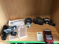 All components displayed on wooden shelf
