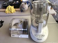 Cuisinart Power Prep Plus food processor base unit with transparent bowl and lid, white control panel with buttons off, on, pulse, double