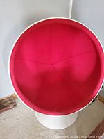 Red fabric interior view showing seating area