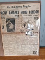 Front page of The Des Moines Register newspaper from August 23, 1940, showing headline about Night Raiders bombing London and other wartime news.