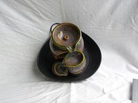 Top-down photo of the ceramic fountain showing the circular water path and scale with a ruler.