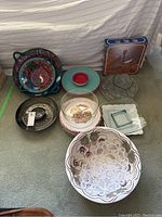 Overall photo of all trays and bowls showing variety of materials and designs
