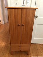 Front view of closed cabinet