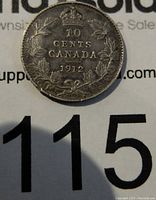 Reverse of 1912 Canada 10 cents silver coin showing denomination, country, year and wreath with crown.