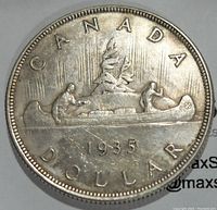Obverse side of 1935 Canada silver dollar coin showing voyageur and Indigenous person in canoe with date '1935' and inscriptions 'CANADA DOLLAR'.