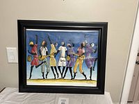 Framed canvas painting showing seven Jamaican musicians playing instruments and dancing, signed by P. Sharo.