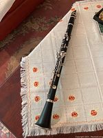 Full assembled clarinet laid out on tablecloth