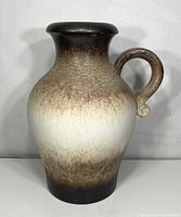 Front view showing body shape, glaze gradient, and handle details.