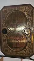 Full view of the map showing both hemispheres, compass instruments, and decorative border.
