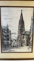 Close-up of the black and white cathedral print showing detailed Gothic architecture and surrounding buildings.
