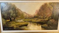 Close up of the painted landscape showing trees, grassy banks and water on the left side of the painting, highlighting color and detail.