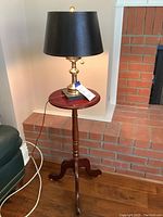 Pedestal side table with turned wood tripod legs and round top